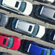 In this aerial photo from a drone, new cars populate a parking lot on May 02, 2020 in Hicksville, New York. Car dealerships have been greatly affected with the loss of sales due to the coronavirus pandemic. (Photo by Bruce Bennett/Getty Images)
